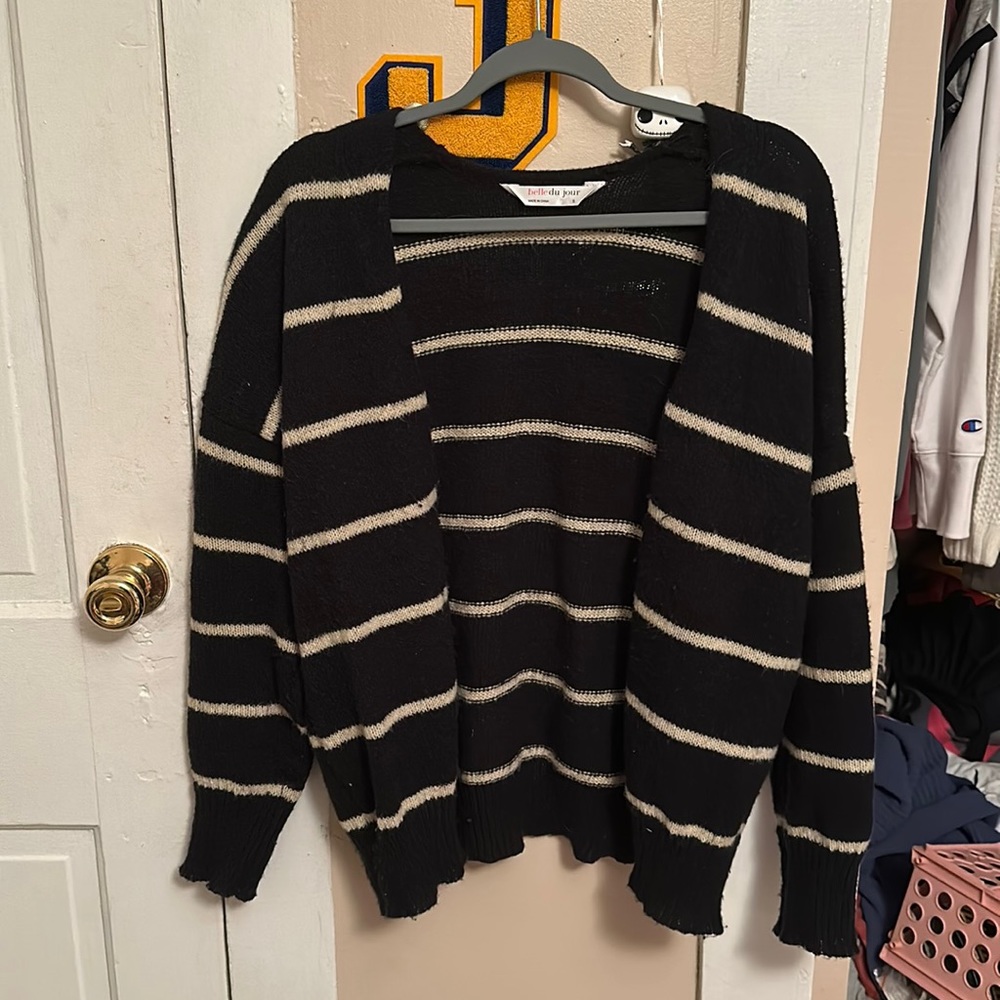 stripped cream and black cardigan.